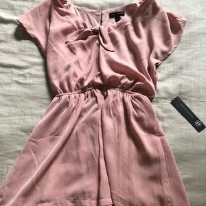 Baby pink romper.